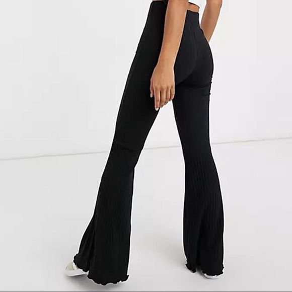 Black Ribbed Flare Pants - Picture 1 of 7